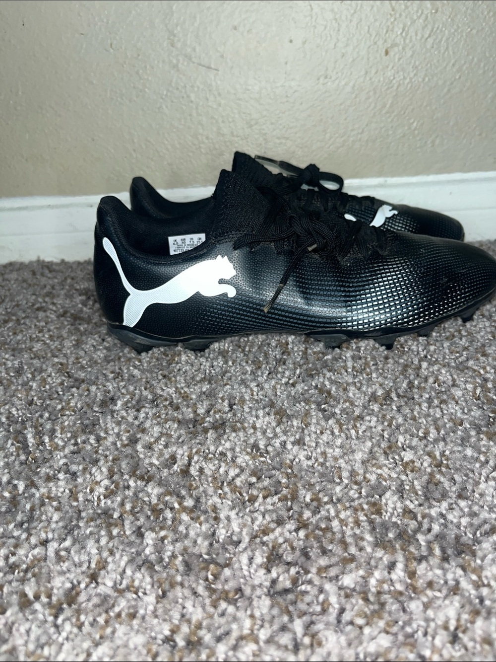 Puma Black Athletic Soccer Cleats with White Puma Logo